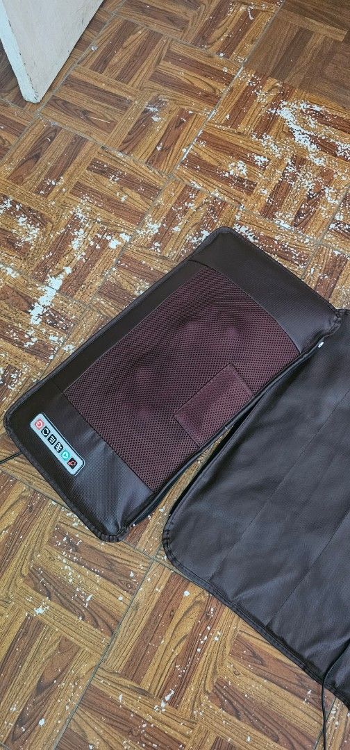 Full Body Massage Mat with Wired Remote and Pillow (Category: Massage Devices) located in Manila. Submitted by anthonylee23810 (Listing ID 1466298078, Image 1). Description: - Brown full body massage mat with separate matching pillow - Wired handheld controller for easy operation - Multiple vibration intensity settings and soothing heat options - Plugs directly into standard wall outlets (adapter included) - Ideal for back pain relief, relaxation