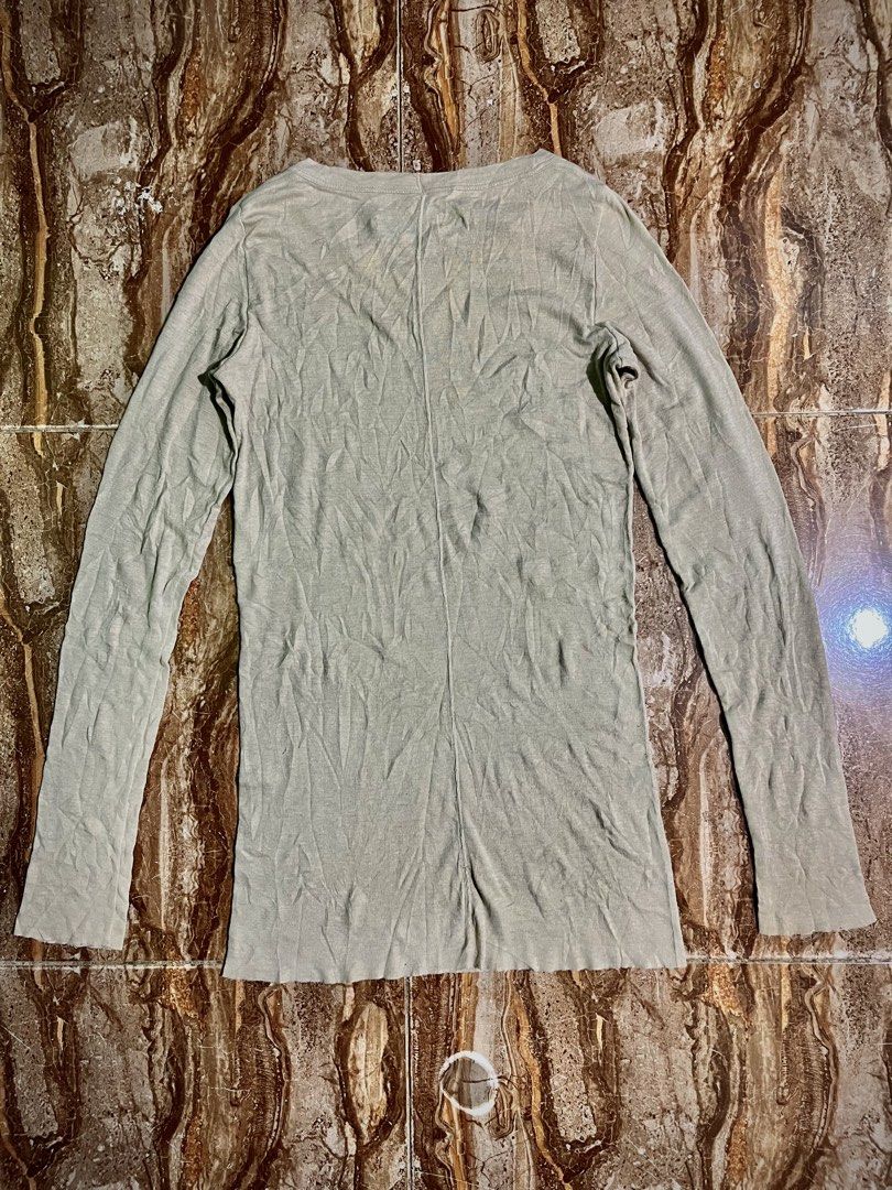 FW2005 RICK OWENS MAINLINE “MOOG” BONE THERMAL LONGSLEEVE (Category: Luxury Apparel) located in Cagayan de Oro. Submitted by middlesosa (Listing ID 1466257459, Image 3). Description: FW2005 RICK OWENS MAINLINE “MOOG” BONE THERMAL LONGSLEEVE SIZE 48 ON TAG WIDTH - 16 inches LENGTH - 29 inches SLEEVE - 29 inches SHOULDER - 13.5 inches STRETCHABLE ONE SIZE MADE IN ITALY RUNWAY PIECE ASYMMETRICAL BACK LINE STITCH UNISEX.