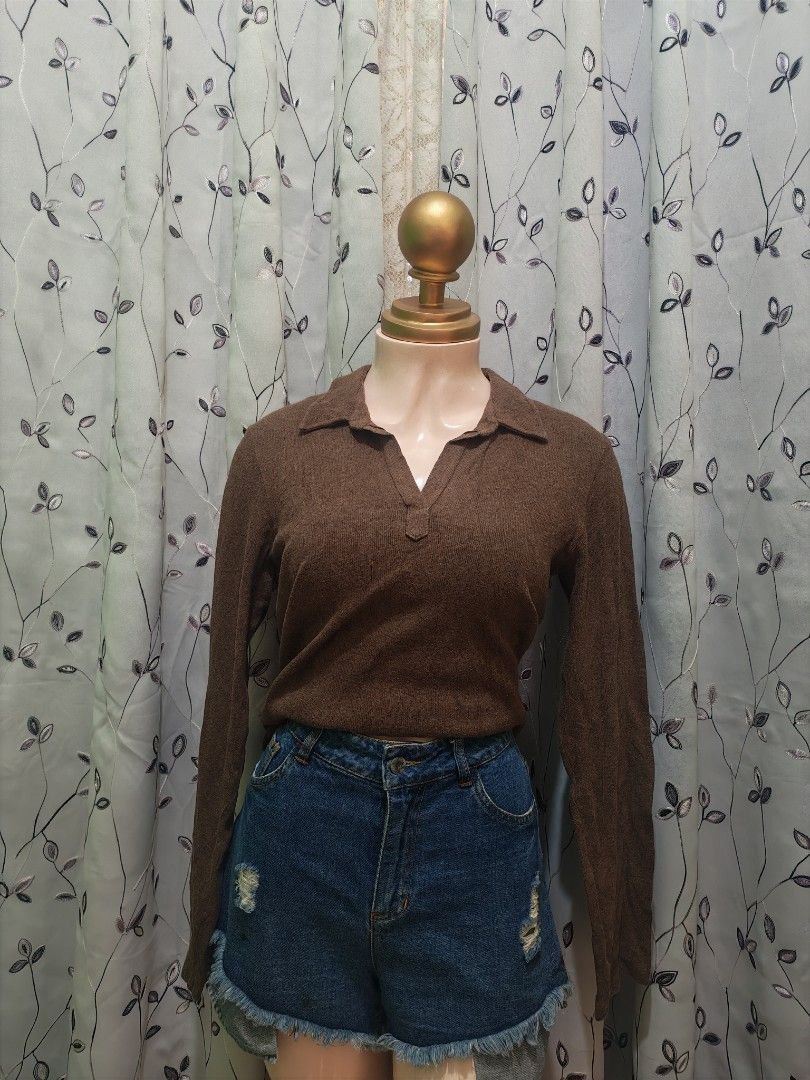 GAP Brown Collared Long Sleeve Knit Top M (Category: Longsleeves) located in Caloocan City. Submitted by _misskaye (Listing ID 1466160865, Image 1). Description: - Brand: Gap - Color: Brown - Size: M (tag intact) - Style: Stretch knit top with classic collar and V-neckline - Fit: Fitted silhouette with long sleeves - Origin: Made in Cambodia - Condition: Excellent, ready to wear!.
