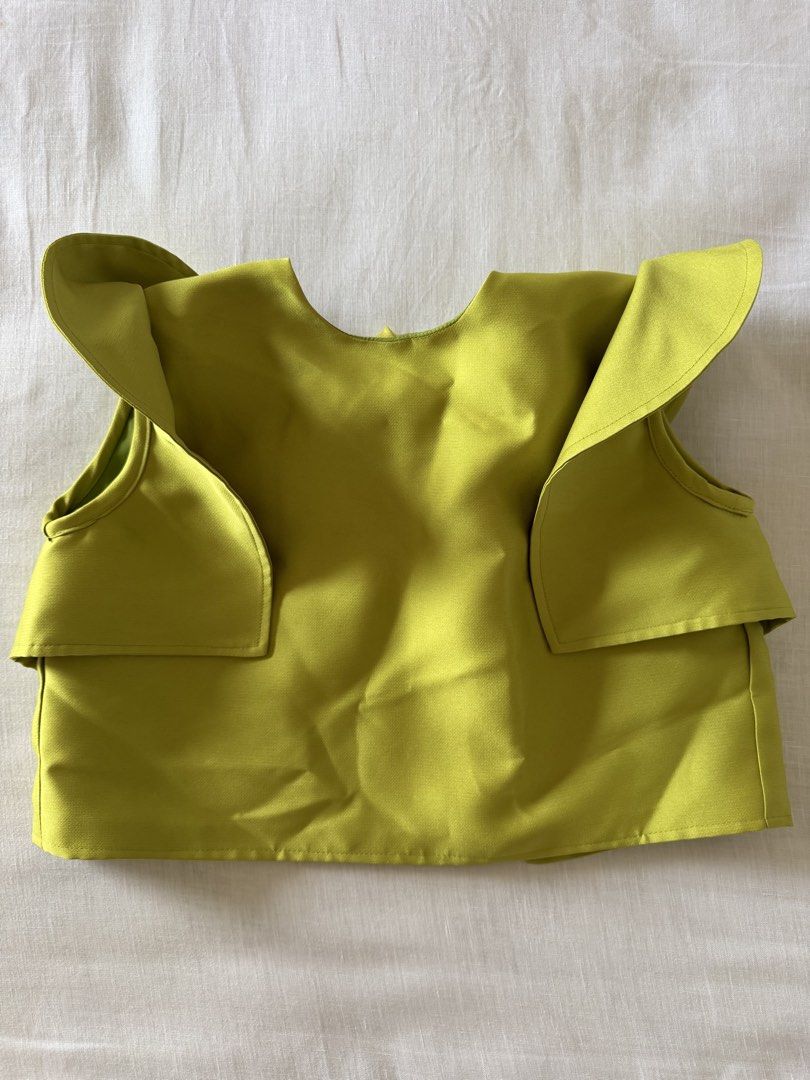 Gavin Ruffy Petal Terno Top in Chartreuse (Category: Sleeveless) located in Muntinlupa City. Submitted by serialdeclutterer (Listing ID 1466156028, Image 3). Description: Very pretty and unique terno top. Used once for a wedding then stored. Needs steaming 😅 RFS: Realized that it’s not my color.