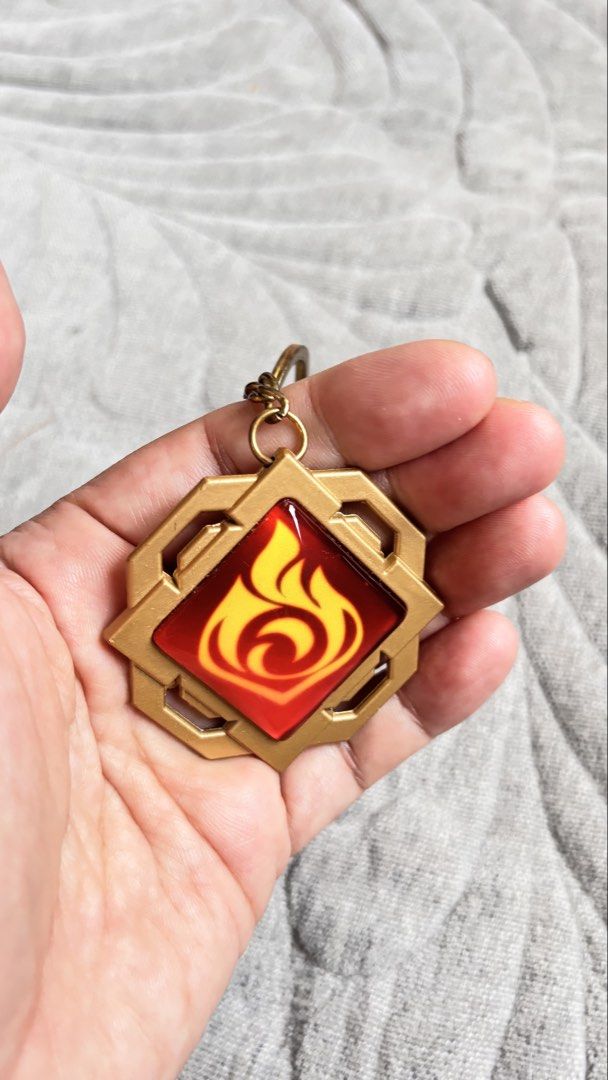 Genshin Impact keychainp (Category: Character Goods) located in Calamba. Submitted by cur8d (Listing ID 1466232250, Image 2). Description: as-is embossed on both sides.