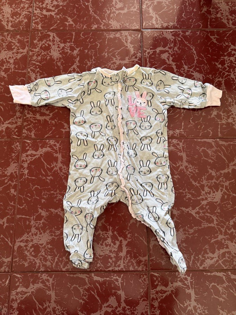 Gerber Baby Bunny Footed Sleeper 0-3M (Category: Babies & Kids Fashion) located in Las Pinas. Submitted by piwiealcantara (Listing ID 1466182044, Image 1). Description: - Brand: Gerber - Size: 0-3 Months - Color/Design: Light grey with all-over bunny rabbit pattern - Details: Pink embroidered "LOVE" patch on the chest - Comfort: 100% soft and breathable cotton - Features: Full zip front for easy changing and built-in footies to keep toes warm - C
