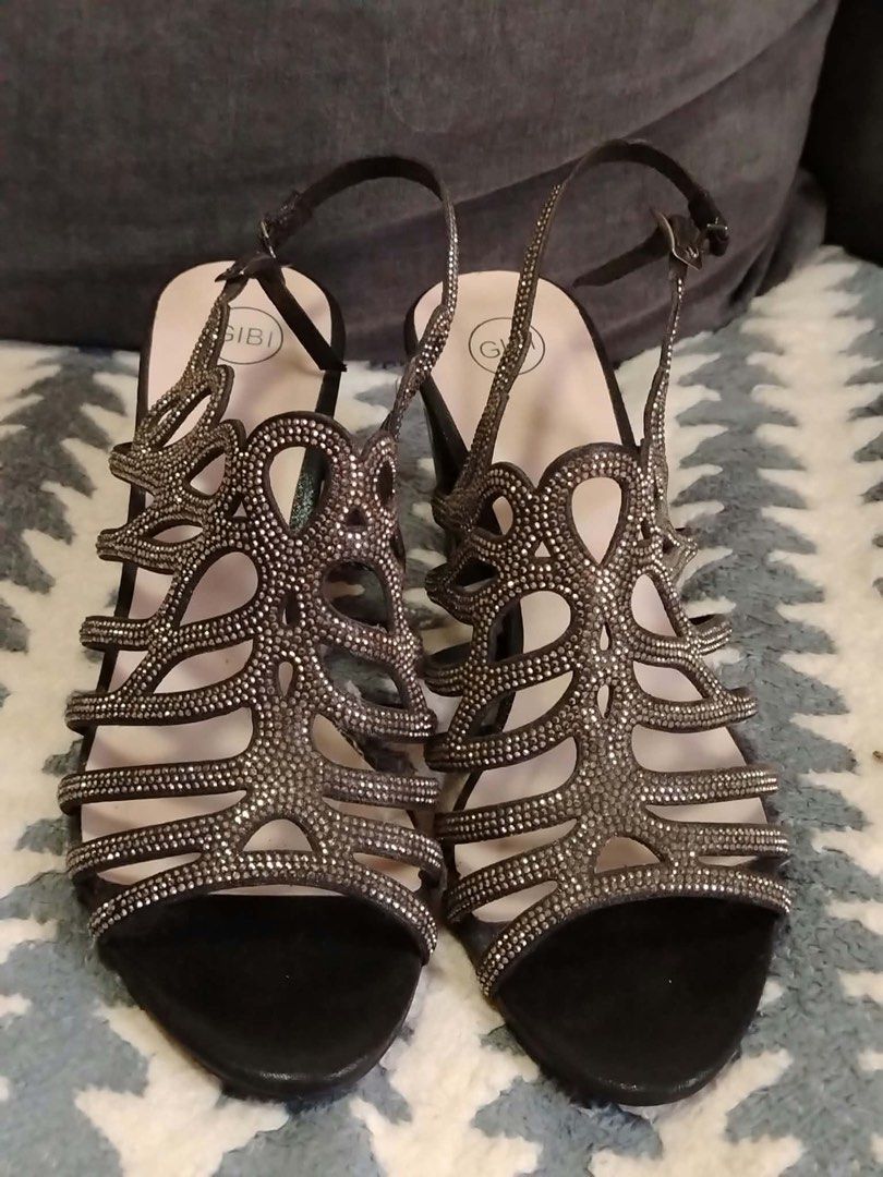 Gibi Adalee Black Rhinestone Heels Size 38 (Category: Heels) located in Rizal. Submitted by sanjane923 (Listing ID 1466225659, Image 1). Description: - Brand/Model: Gibi Adalee Sandals - Size: EU 38 - Color: Classic Black with Patent Block Heel - Design: Open toe with intricate rhinestone strap detailing - Closure: Slingback strap with adjustable buckle - Condition: Uppers and rhinestones are intact and excellent; normal wear on soles from previo