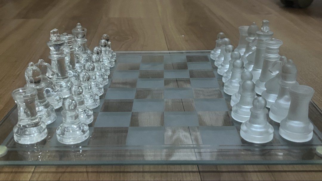 Glass Chess Set (Category: Board Games & Puzzles) located in Quezon City. Submitted by probrofister (Listing ID 1466280128, Image 2). Description: 10x10 inch chessboard 2-inch tall kings ***One rubber grip on the chessboard is missing (see pictures) Location: Tandang Sora, QC Pay thru Gcash/COD and deliver thru Lalamove, etc..