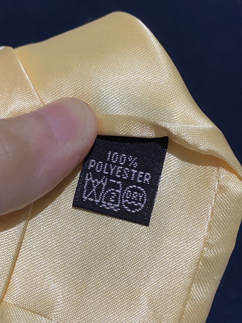Gold satin necktie (Category: Ties) located in Manila. Submitted by resi.diaz (Listing ID 1466244587, Image 3). Description: - Color: Smooth gold with a subtle sheen - Material: 100% durable and easy-to-care-for polyester - Width: Standard blade - Style: Solid, classic design - Occasion: Ideal for formal wear, weddings, or office attire - Condition: Brand new with clean tag attached.