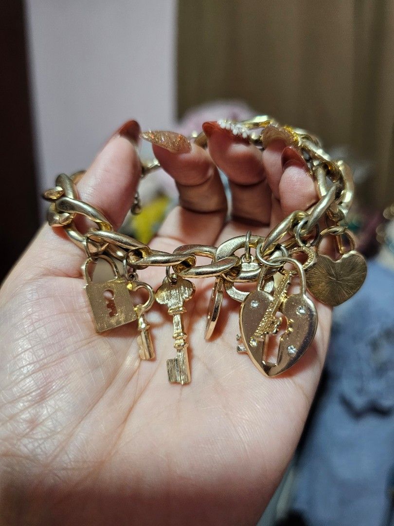 Gold tone charm studded bracelet (Category: Bracelets) located in Angeles City. Submitted by kodachi10 (Listing ID 1466184262, Image 2). Description: pretty charm bracelet adjustable. fits small to large wrists.