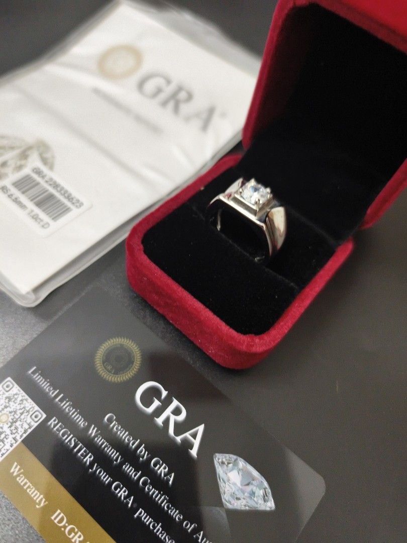 GRA Moissanite Ring 1.0ct D 6.5mm (Category: Rings) located in Angeles City. Submitted by measaliman02351 (Listing ID 1466225888, Image 2). Description: - Center Stone: 1.0ct D color moissanite (6.5mm) - Setting: Secure silver-tone band - Inclusions: Original red velvet ring box, GRA moissanite report, and authenticity warranty card (ID: 228333623) - Condition: Brand new, ready for gifting or personal wear.