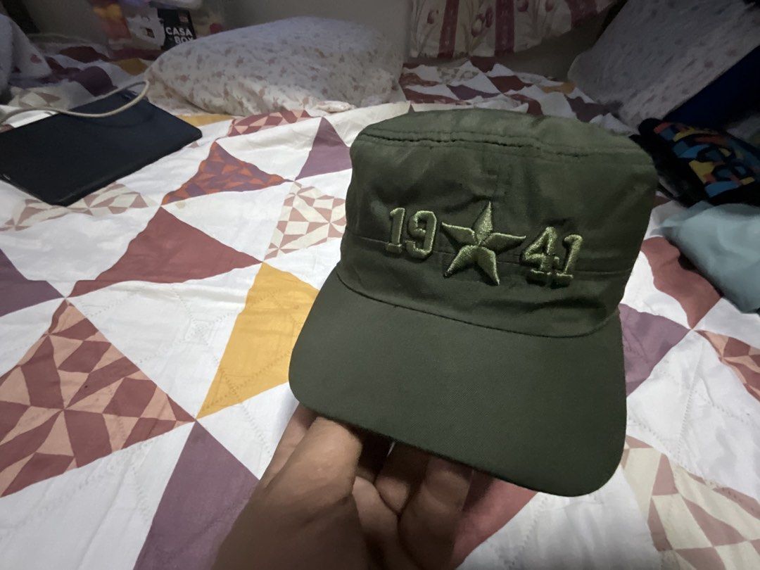 Green Army 1941 Embroidered Cadet Cap (Category: Caps & Hats) located in Davao. Submitted by wildfish.3386b7 (Listing ID 1466273341, Image 1). Description: - Color: Deep olive green shade - Design: Classic military-style flat top with curved brim - Embroidery: '1941' and star detail across the front - Fit: Adjustable strap at the back for sizing - Style: Great for daily wear, outdoor trips, or street style outfits.