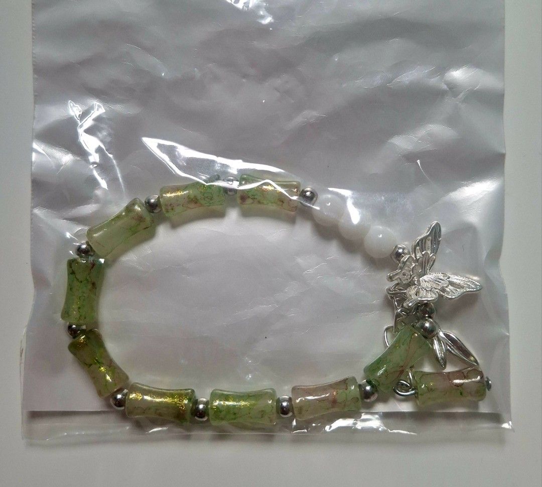 Green beaded bracelet with butterfly charm (Category: Bracelets) located in Taguig. Submitted by fits.for.less (Listing ID 1466165774, Image 1). Description: 60 pesos MOP: Gcash MOD: lalamove/grab, pick-up if malapit lang.