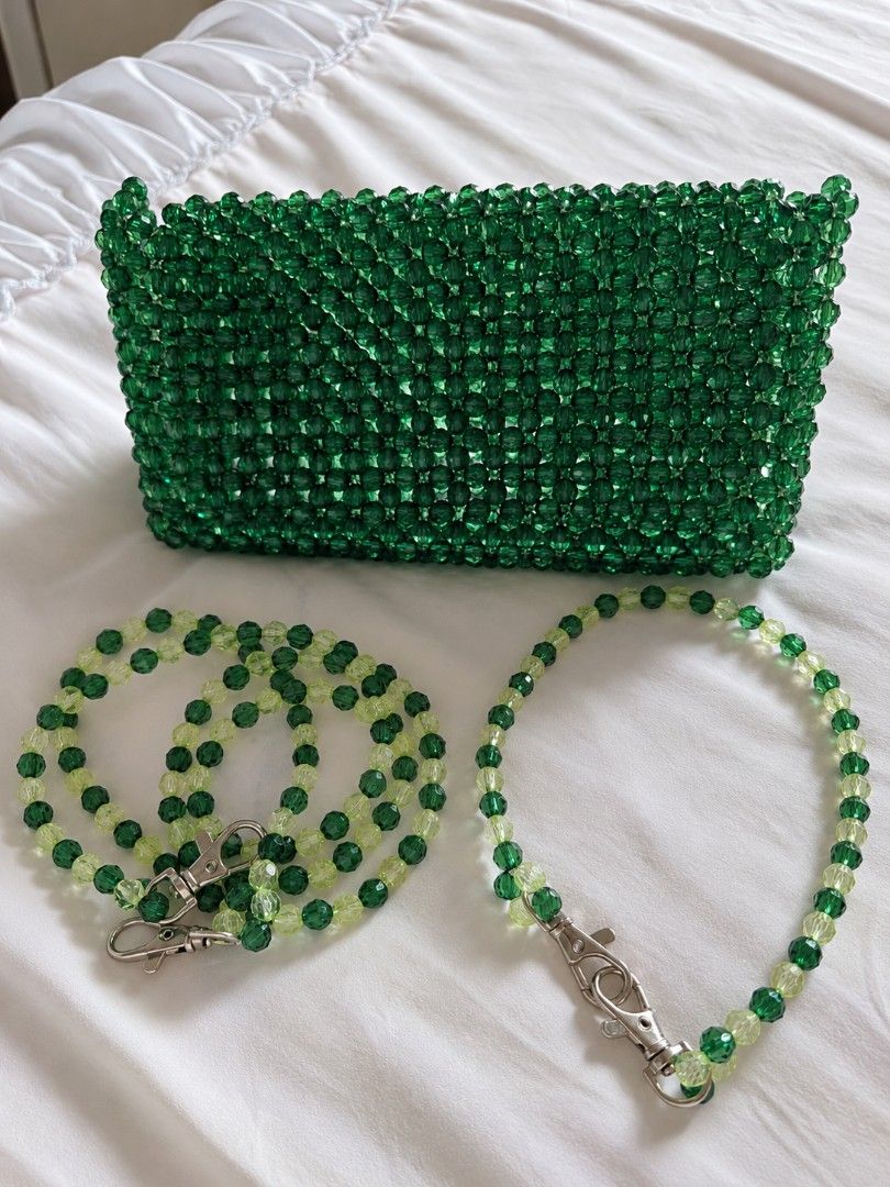 Green beaded shoulder bag with interchangeable straps (Category: Shoulder Bags) located in Paranaque City. Submitted by amjscloset (Listing ID 1466208679, Image 2). Description: - Club Kalee - Color: Emerald green with dark green and lime green bead accents - Shape: Structured rectangular fully beaded clutch - Straps: Includes 2 detachable beaded straps in different lengths with silver clasps - Condition: Excellent / Used once - Mode of Payment: 
