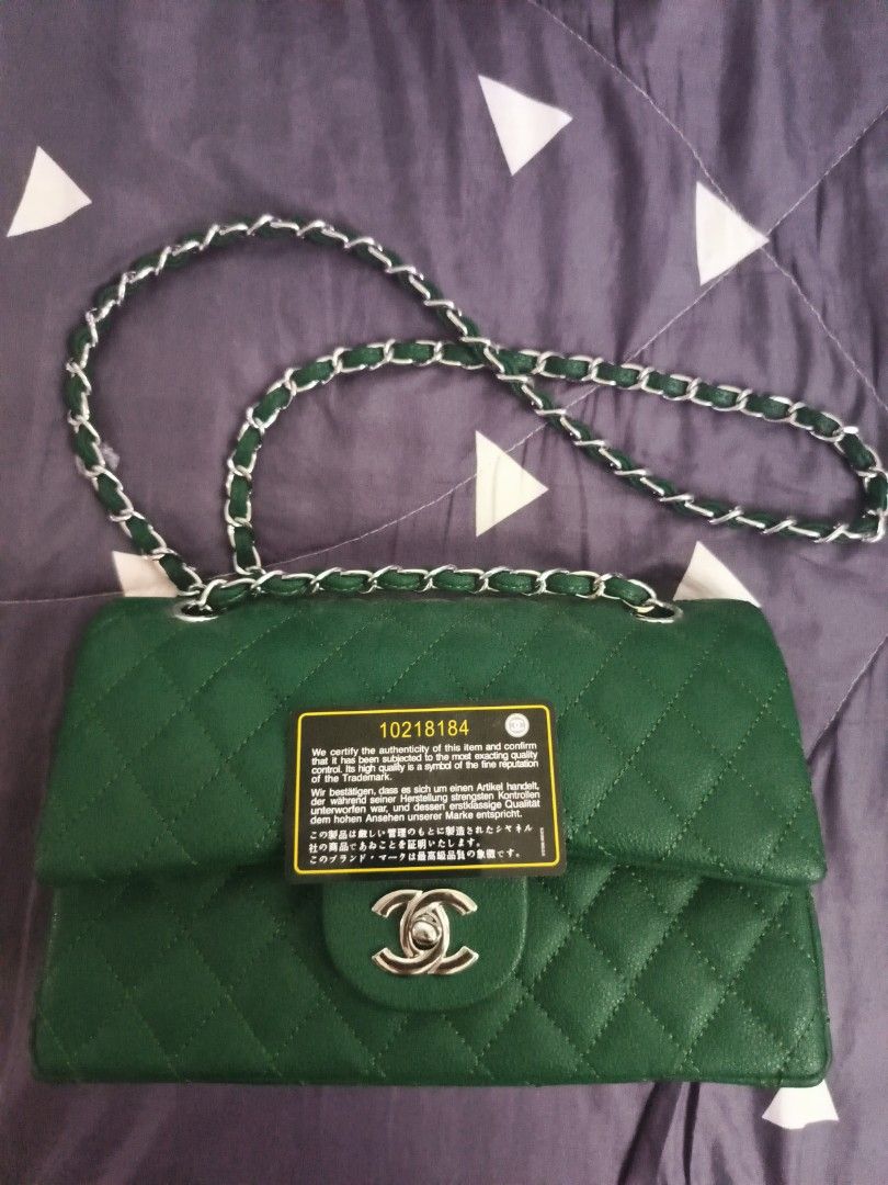 Green Quilted Leather Chain Shoulder Bag (Category: Shoulder Bags) located in Manila. Submitted by ice_icegadgets (Listing ID 1466204776, Image 1). Description: - Color: Emerald Green - Material: Quilted Leather - Hardware: Silver - Closure: Classic CC turn-lock on front flap - Strap: Intertwined chain and leather shoulder strap (Green & Silver) - Inclusions: Black authentication card with serial number 10218184 - Design: Structured quilted patte