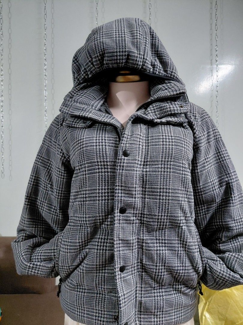 Grey plaid hooded winter jacket (Category: Coats, Jackets and Outerwear) located in Baguio. Submitted by undressme24 (Listing ID 1466296020, Image 3). Description: - Style: Grey and black plaid hooded puffer jacket - Size: Medium (tag inside) - Closure: Snap buttons down the front - Lining: Smooth black inner lining - Features: Thick, highly warm material, ideal for cold weather.