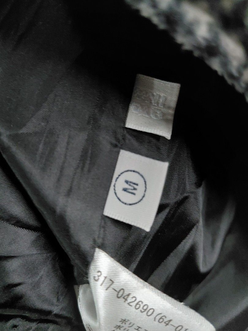 Grey plaid hooded winter jacket (Category: Coats, Jackets and Outerwear) located in Baguio. Submitted by undressme24 (Listing ID 1466296020, Image 2). Description: - Style: Grey and black plaid hooded puffer jacket - Size: Medium (tag inside) - Closure: Snap buttons down the front - Lining: Smooth black inner lining - Features: Thick, highly warm material, ideal for cold weather.