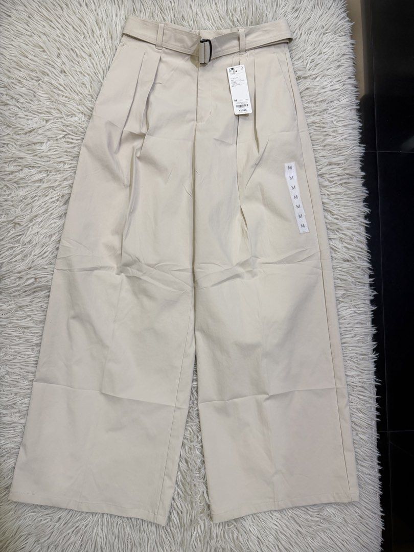 GU Belted Wide Pants Beige Size M (Category: Jeans) located in Manila. Submitted by kristinata44809 (Listing ID 1466176451, Image 1). Description: - Brand: GU - Item: Belted wide pants - Color: Beige - Size: M (Waist 66cm) - Condition: Brand new with tags (BNWT), unworn - Details: High-waisted style, pleated front, matching fabric belt included - Extras: Original spare button attached inside.