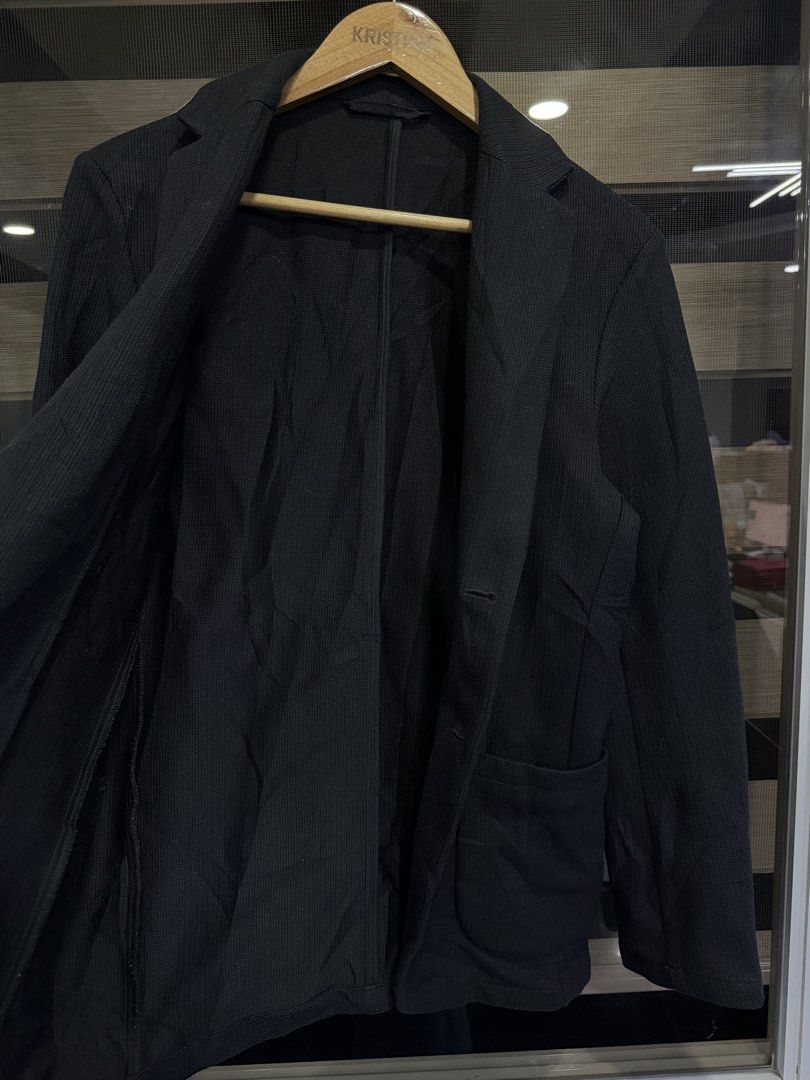 GU Black Ribbed Knit Blazer (Category: Coats, Jackets and Outerwear) located in Manila. Submitted by kristinata44809 (Listing ID 1466176853, Image 3). Description: - Brand: GU - Color: Black - Material: 100% polyester with a textured ribbed pattern - Features: Two front patch pockets, two-button closure, notched lapels, unlined interior - Condition: Clean with minimal wear - Style: Great casual layer for everyday outfits.