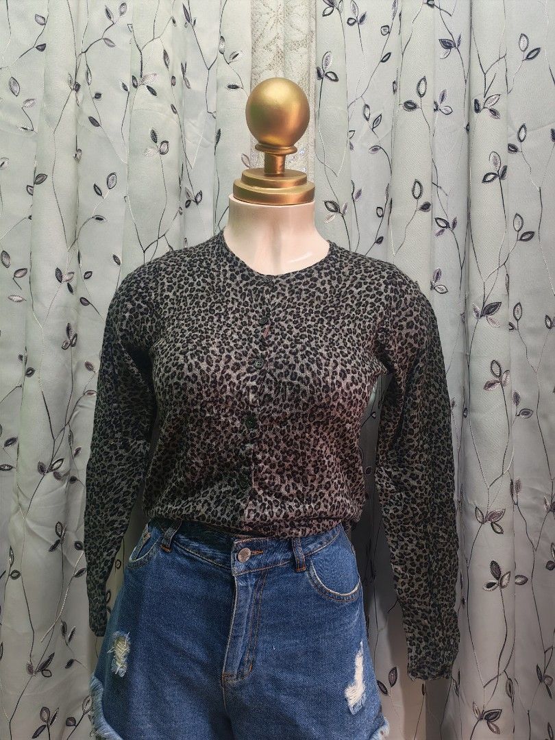 GU Leopard Print Cardigan Grey Black Button Up (Category: Coats, Jackets and Outerwear) located in Caloocan City. Submitted by _misskaye (Listing ID 1466160110, Image 2). Description: GU cardigan in a grey and black leopard print. Crew neckline with front button closure. Long sleeves, ribbed knit hem and cuffs. 100% acrylic material. Lightweight knit layer for everyday wear..