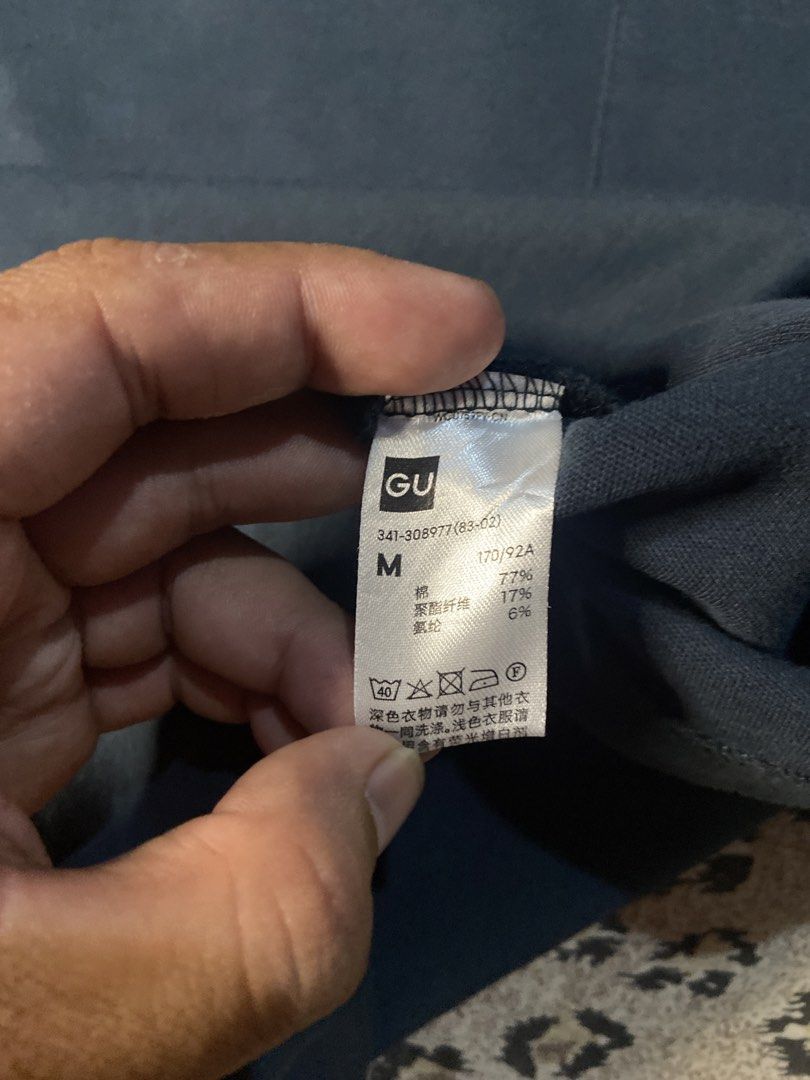 GU Navy Pocket T-Shirt Size M (Category: Tshirts & Polo Shirts ) located in Manila. Submitted by nix.thrift (Listing ID 1466204319, Image 3). Description: -21x25 - Brand: GU - Color: Navy Blue - Size: Medium (M) - Material: Cotton, polyester, and spandex blend for a soft feel - Design: Classic crew neck with a single left chest pocket - Fit: Standard casual fit - Condition: Clean and well-maintained - Style: Great everyday basic to pair with jean