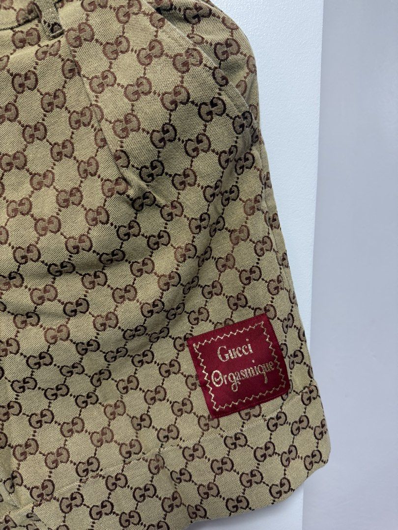 Gucci GG Monogram Orgasmique Canvas Shorts (Category: Shorts) located in Cauayan City . Submitted by msdianavarro (Listing ID 1466320971, Image 2). Description: Gucci GG Canvas Shorts from the iconic "Orgasmique" collection. Featuring the classic all-over beige/brown GG supreme monogram pattern and accented by the signature red statement patch on the lower leg. Excellent structured fit that elevates any streetwear or luxury casual outfit..