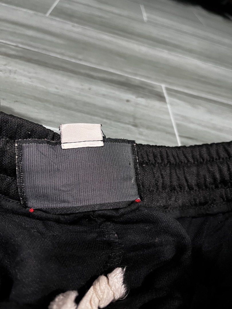 Gucci GG Monogram Track Pants Black Size S (Category: Joggers) located in Cabuyao City. Submitted by undergroundthrift03 (Listing ID 1466319419, Image 3). Description: - Brand: Gucci - Color: Black with white and black side stripes - Details: Signature GG monogram pattern on outer side panels, drawstring waist, and front zipper pockets - Fit/Size: Size S (175/78A) with ribbed ankle cuffs - Material & Origin: Soft fabric, Made in Italy - Style: Cl