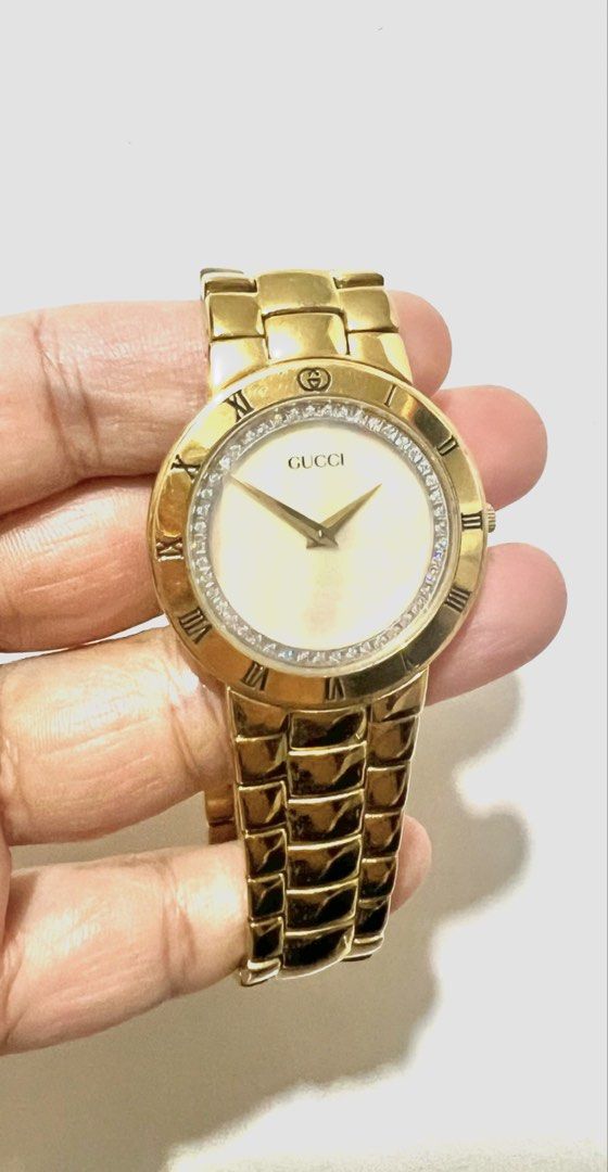 Gucci Gold Plated Watch with Diamonds (Category: Luxury Watches) located in Antipolo. Submitted by cyloveak1328 (Listing ID 1466287480, Image 2). Description: Authentic Rare Piece 18K Gold Plated Mother of Pearl Dial with Diamonds Full Refund if Proven Fake See to appreciate .