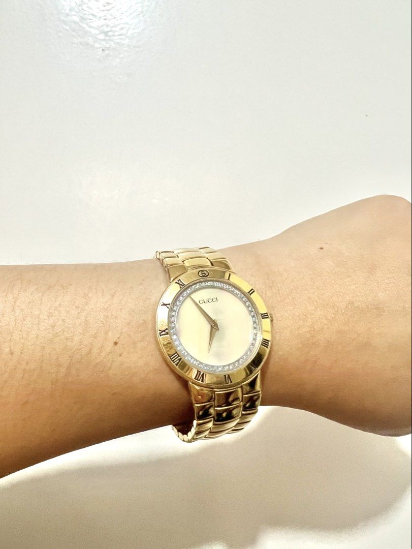 Gucci Gold Plated Watch with Diamonds (Category: Luxury Watches) located in Antipolo. Submitted by cyloveak1328 (Listing ID 1466287480, Image 1). Description: Authentic Rare Piece 18K Gold Plated Mother of Pearl Dial with Diamonds Full Refund if Proven Fake See to appreciate .