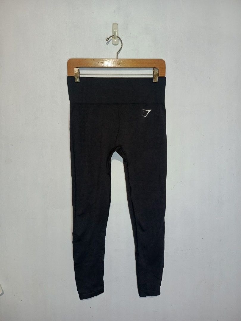 GYMSHARK SEAMLESS LEGGINGS (Category: Activewear) located in Baguio. Submitted by 074thriftmania (Listing ID 1466255007, Image 1). Description: - Brand: Gymshark - Item: Black seamless leggings - Size: Medium - Fit: High-waisted with supportive ribbed waistband - Details: Iconic Gymshark logo near hip and lower leg - Material: 55% nylon, 33% polyester, 12% elastane - Condition: Wash tag intact, great for workouts or daily wear.
