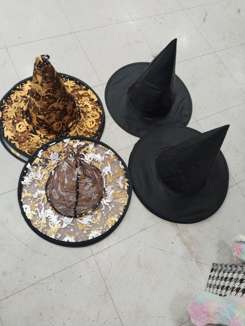 Halloween Witch Hats Bundle Set of Four (Category: Caps & Hats) located in Manila. Submitted by zdmal (Listing ID 1466183545, Image 2). Description: - Set of 4 unique witch hats - Includes 2 plain black shiny fabric hats - 1 gold and black patterned hat - 1 silver and gold patterned hat with sheer mesh brim - Perfect for Halloween costumes or party decor - Sold as a set only - Pick-up or delivery options available.