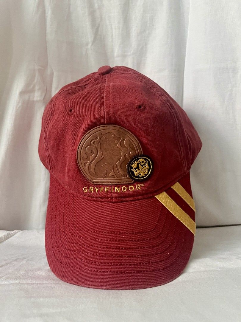 Harry Potter Gryffindor House Baseball Cap (Category: Character Goods) located in Silay City. Submitted by rje16 (Listing ID 1466290148, Image 1). Description: Harry Potter Gryffindor House Baseball Cap 🦁❤️ 🇯🇵 Bought in Japan Seldom used / Very good condition Authentic Harry Potter merchandise Price: ₱1,500 RFS: Seldom used.