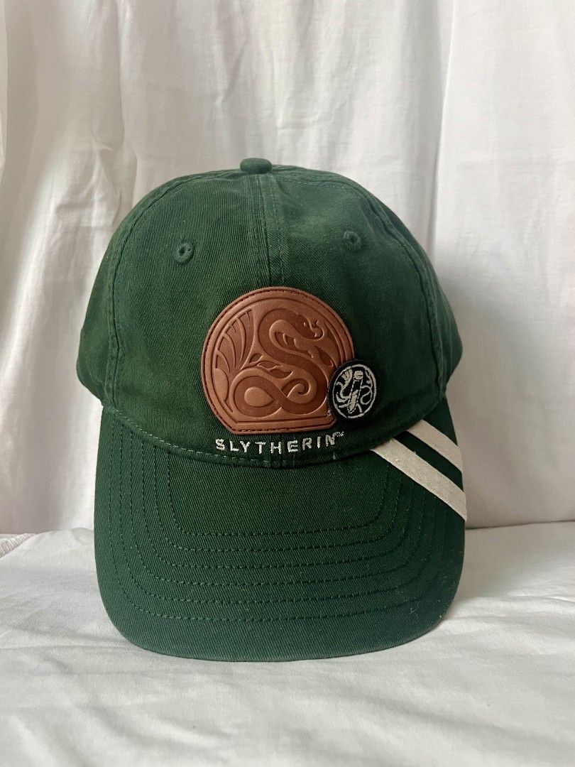 Harry Potter Slytherin House Baseball Cap (Category: Character Goods) located in Silay City. Submitted by rje16 (Listing ID 1466289680, Image 1). Description: Harry Potter Slytherin House Baseball Cap 🐍💚 🇯🇵 Bought in Japan Seldom used / Very good condition Authentic Harry Potter merchandise Price: ₱1,500 RFS: Seldom used.