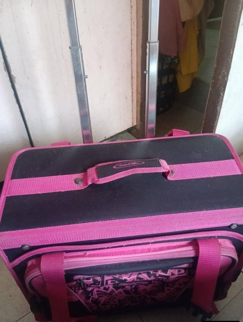 Hawk Trolley Bag (Category: Stationery & School Supplies) located in Bulacan. Submitted by threekids113114 (Listing ID 1466179712, Image 2). Description: Php 1,500 only LIKE NEW SELLING THIS HAWK TROLLEY BAG, ALMOST NEW Bought at around 4,500 php Selling for: 1,500 php Ships from Meycauayan Bulacan Lalamove Ready Issue: wala lang ung tumbler and needs some cleaning .
