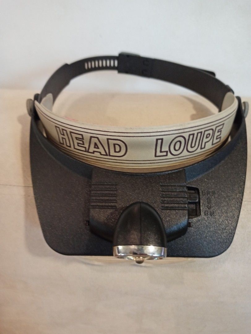 Head Loupe Magnifier Visor with LED Light (As is sa light) (Category: Medical Supplies & Tools) located in Caloocan City. Submitted by rtarellano (Listing ID 1466210505, Image 2). Description: - Adjustable headband magnifier with clear front lenses - Built-in LED light with convenient top power switch. As is sa ilaw - Comfortable padded backing for extended wear - Keeps both hands free for detailed work - Ideal for crafts, hobbies, repairs, and c