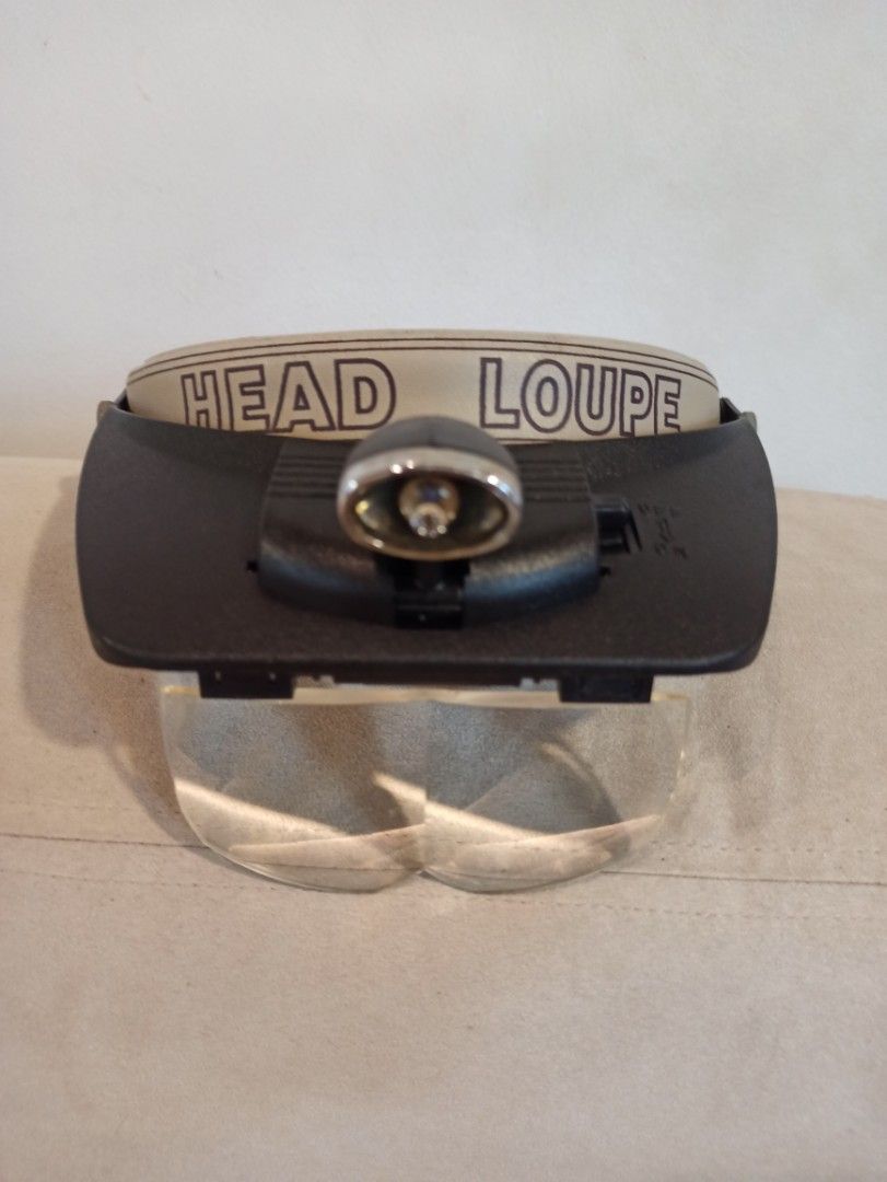 Head Loupe Magnifier Visor with LED Light (As is sa light) (Category: Medical Supplies & Tools) located in Caloocan City. Submitted by rtarellano (Listing ID 1466210505, Image 1). Description: - Adjustable headband magnifier with clear front lenses - Built-in LED light with convenient top power switch. As is sa ilaw - Comfortable padded backing for extended wear - Keeps both hands free for detailed work - Ideal for crafts, hobbies, repairs, and c