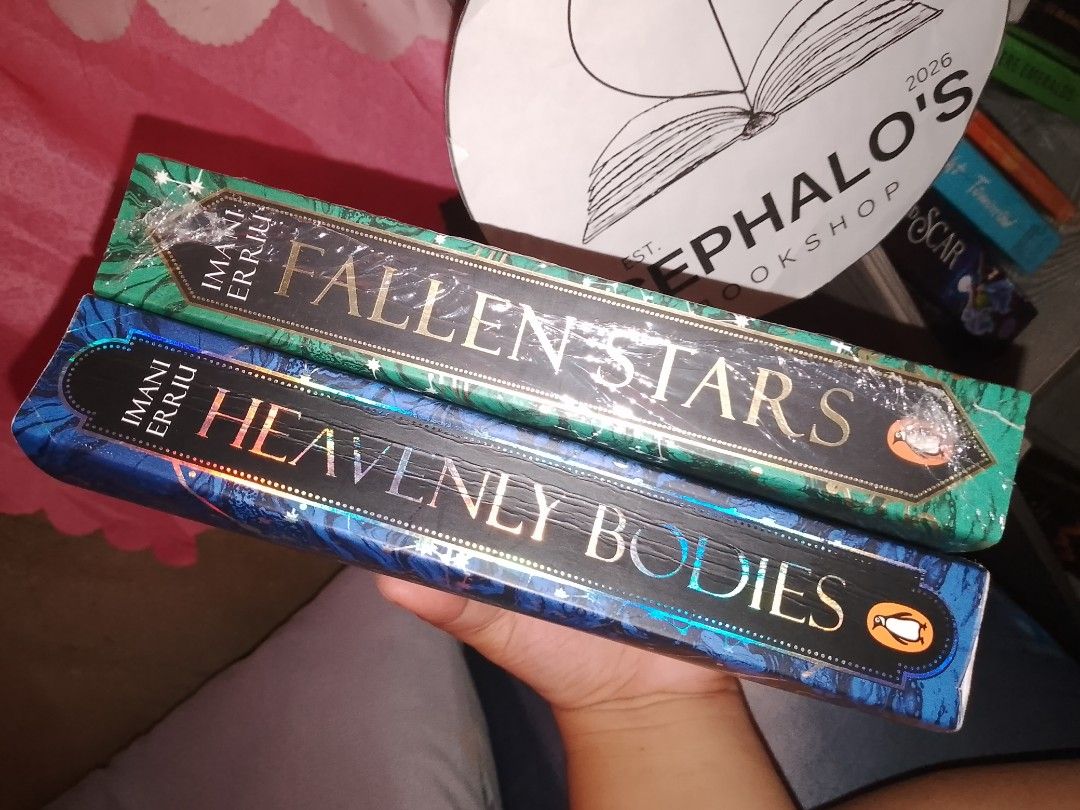 Heavenly Bodies Duology (Category: Storybooks) located in Dumaguete. Submitted by justmeanyo.h (Listing ID 1466271885, Image 2). Description: book 1 - with spine creases, pre-loved, still GC book 2 - like new sealed 970 for 2 books MOD: SCO, Tiktok, Direct JNT MOP: GCASH/Maribank.