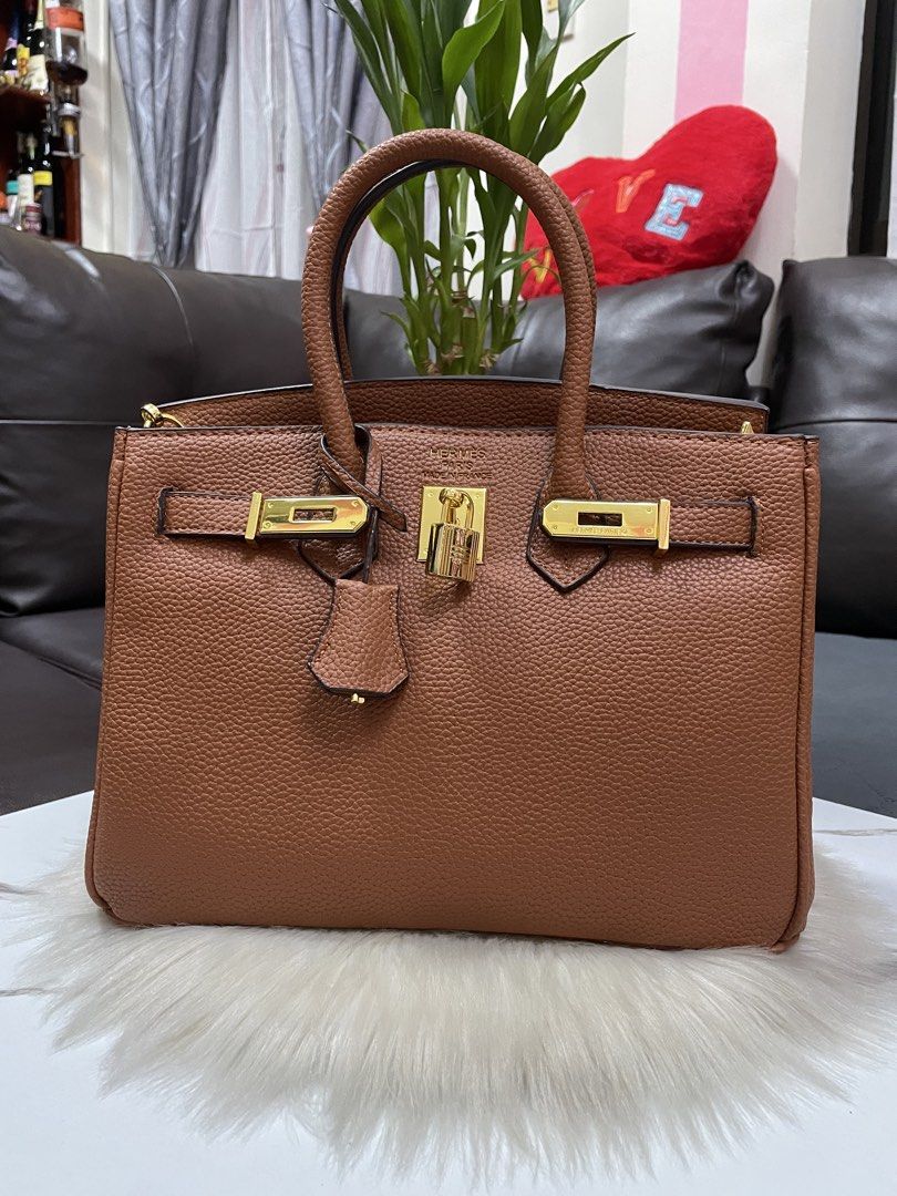Hermes Birkin (Category: Luxury Bags & Wallets) located in Mandaue City. Submitted by ludz_0246 (Listing ID 1466277124, Image 2). Description: Coded etekita Gold hardware In 30cm Color Tan or Brown Dustbag With long strap No issue.