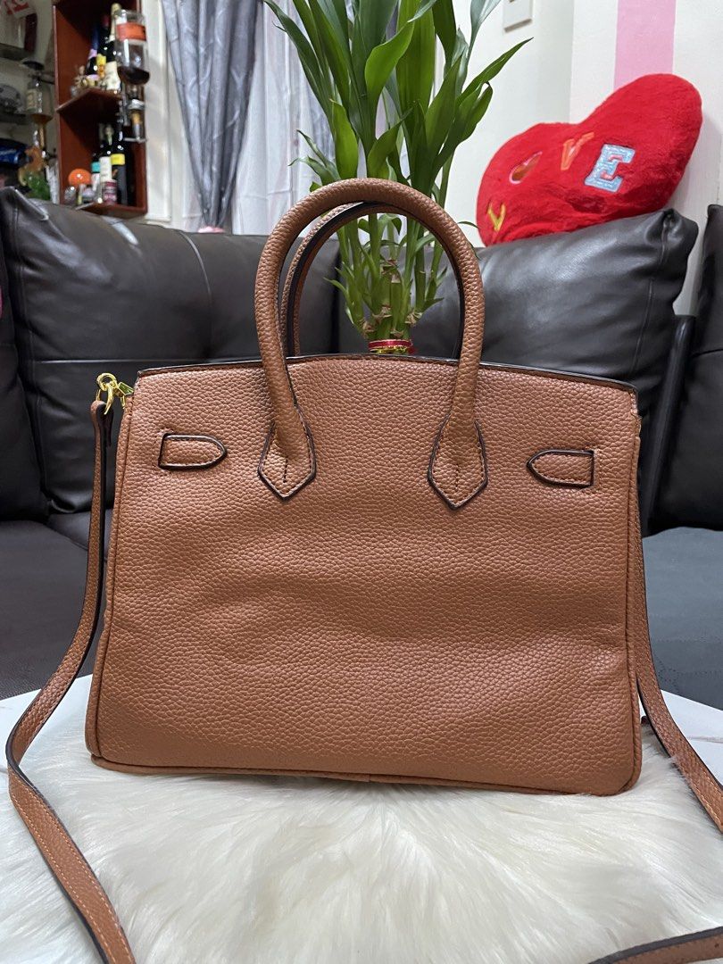 Hermes Birkin (Category: Luxury Bags & Wallets) located in Mandaue City. Submitted by ludz_0246 (Listing ID 1466277124, Image 3). Description: Coded etekita Gold hardware In 30cm Color Tan or Brown Dustbag With long strap No issue.