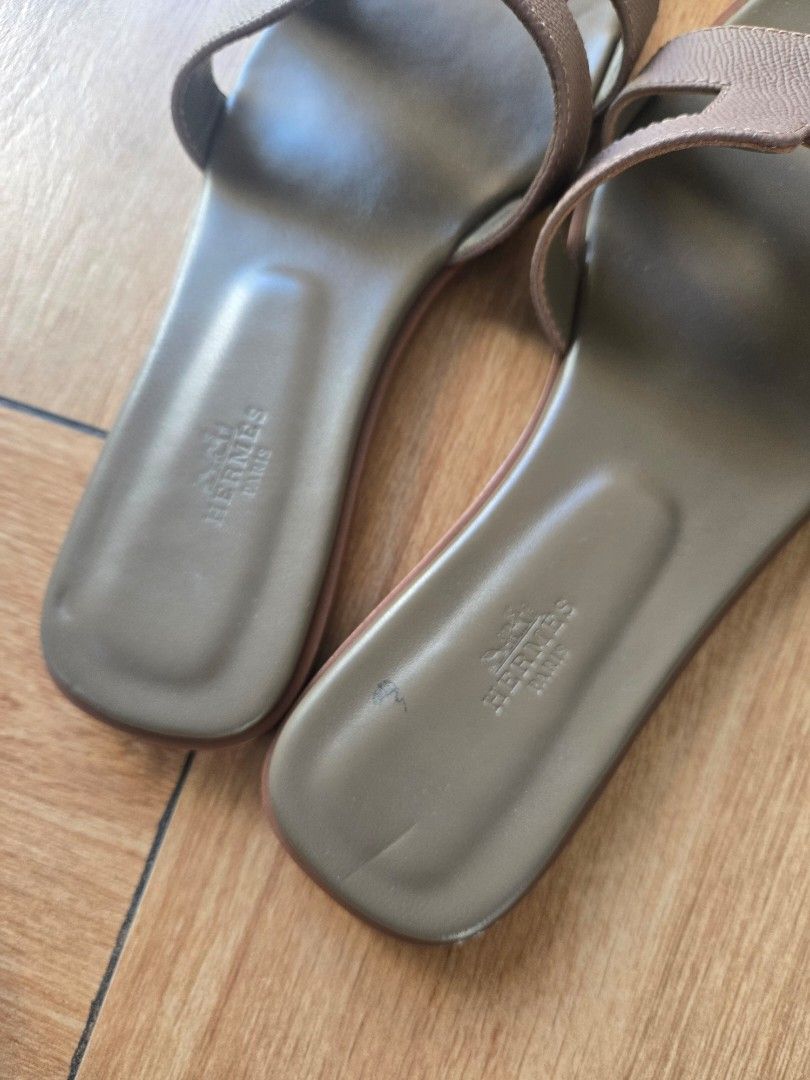 Hermes Oran Sandals (Category: Flats & Sandals) located in Marikina City. Submitted by aj.preloved (Listing ID 1466336398, Image 3). Description: Guaranteed Authentic Hermes Oran sandals in taupe calfskin leather. Fits 8.5 to 9 slim feet Heavy wear on the leather outsoles and minor scuffing on the insoles and toe edges. (see 4th photo) Price is slightly negotiable.