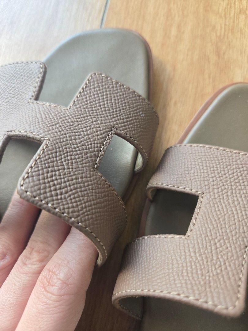 Hermes Oran Sandals (Category: Flats & Sandals) located in Marikina City. Submitted by aj.preloved (Listing ID 1466336398, Image 2). Description: Guaranteed Authentic Hermes Oran sandals in taupe calfskin leather. Fits 8.5 to 9 slim feet Heavy wear on the leather outsoles and minor scuffing on the insoles and toe edges. (see 4th photo) Price is slightly negotiable.
