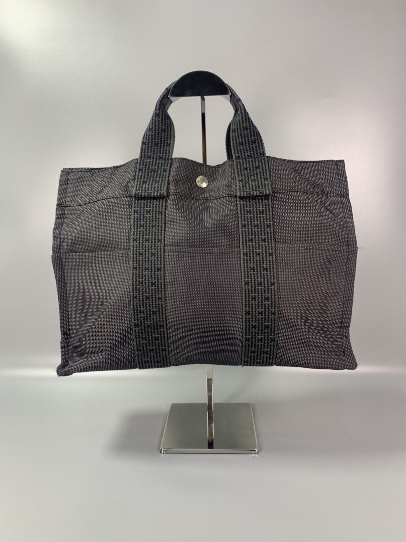 Hermès Herline canvas tote (Category: Tote Bags) located in Mabalacat. Submitted by vtgmalan (Listing ID 1466282328, Image 1). Description: Brand : Hermès Herline canvas tote Price: 8,500 Condition : Very Good Condition Product Condition Rank : AB Issue/s : N/A Dimensions : 14 x 10 x 4 (LxHxW) Inclusions: Shipping Fee Shoulder By Buyer Note : Please make sure to check all the photos before mine..