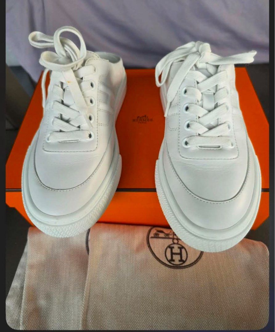 Hermès Keep Sneaker Mules White (Category: Sneakers & Footwear) located in Makati City. Submitted by goodconditionguaranteed (Listing ID 1466303862, Image 1). Description: - Brand: Hermès - Model: Keep Sneaker Mules - Color: Crisp White - Material: Premium Calfskin - Design: Slip-on with lace-up front and iconic tonal H stitching - Origin: Made in Italy - Inclusions: Original orange box and dust bag - Condition: Soles show minor signs of wear, we