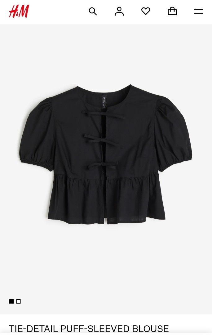 H&M Black Tie-Front Peplum Blouse (Category: Blouses) located in San Carlos. Submitted by my.excess.stuff (Listing ID 1466335771, Image 1). Description: - Brand: H&M - Color: Black - Style: Short-sleeve top with puff sleeves and tie-front ribbon closure - Details: Flared peplum hem for extra texture - Material: Lightweight cotton - Best paired with: High-waisted jeans for a casual day out.