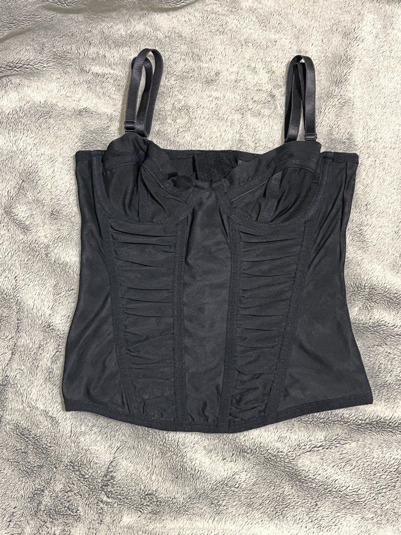 H&M corset mesh bustier top (Category: Sleeveless) located in Manila. Submitted by attyaj (Listing ID 1466298926, Image 3). Description: - Color: Black - Material: Stretchy mesh fabric - Design: Structured underwire cups with front ruching for a fitted silhouette - Features: Adjustable shoulder straps and secure back hook-and-eye closure - Condition: Clean and ready to wear rfs: too small.