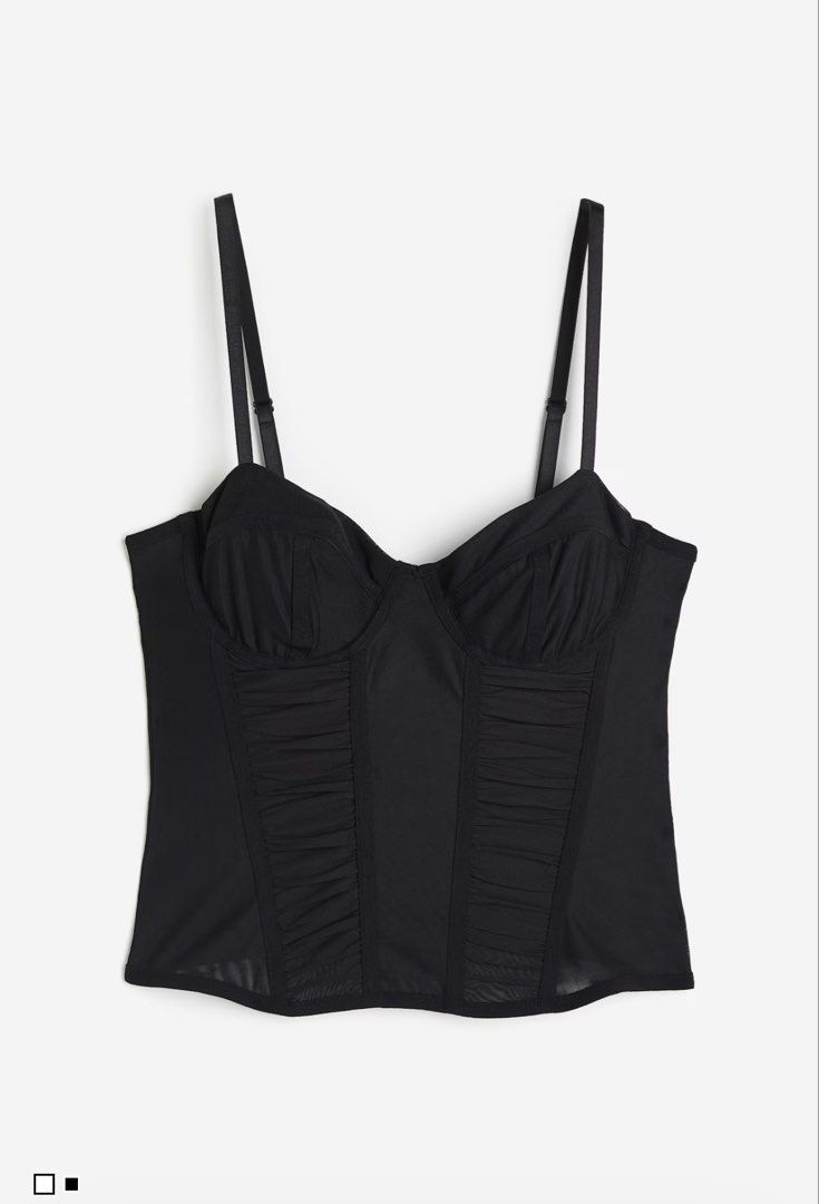 H&M corset mesh bustier top (Category: Sleeveless) located in Manila. Submitted by attyaj (Listing ID 1466298926, Image 1). Description: - Color: Black - Material: Stretchy mesh fabric - Design: Structured underwire cups with front ruching for a fitted silhouette - Features: Adjustable shoulder straps and secure back hook-and-eye closure - Condition: Clean and ready to wear rfs: too small.
