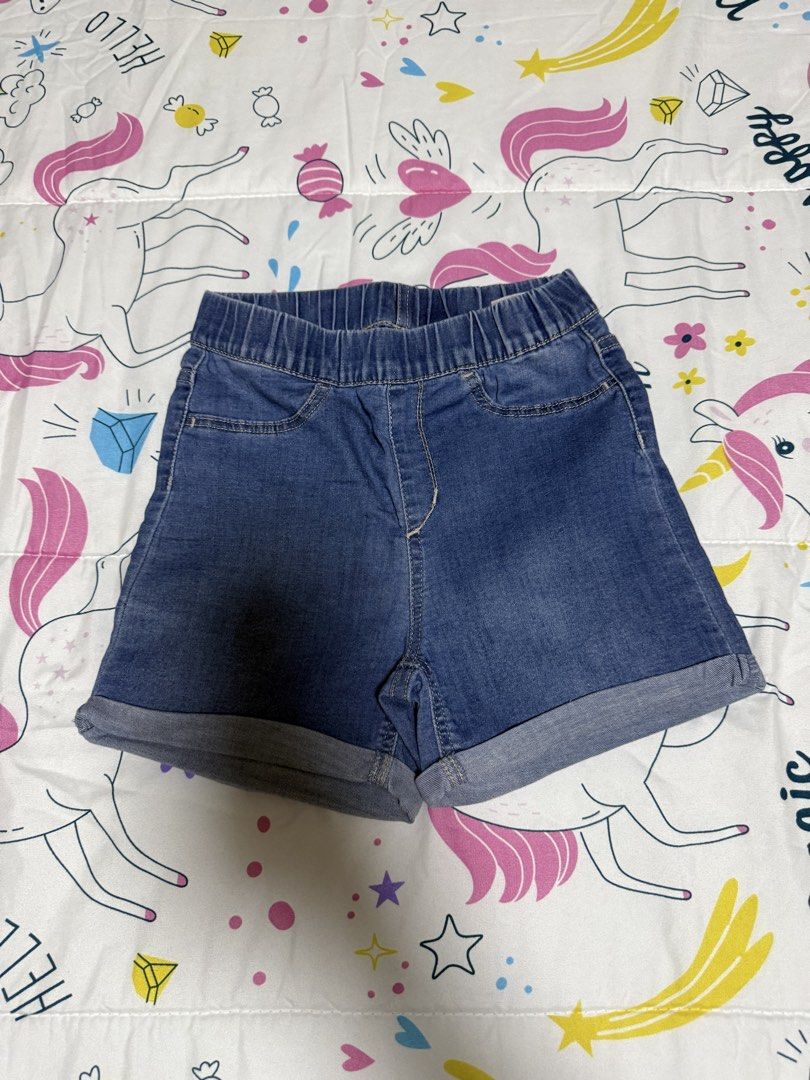 H&M Denim Blue Cuffed Denim Shorts (Category: Babies & Kids Fashion) located in Calamba. Submitted by sofiesmerch (Listing ID 1466336569, Image 1). Description: - Brand: Denim brand - Color: Blue - Size: UK 9-10Y, CN 140/60 - Material: 69% cotton, 28% polyester, 3% elastane - Style: Pull-on with elastic waistband and rolled-up cuffs - Condition: Great casual piece for everyday.