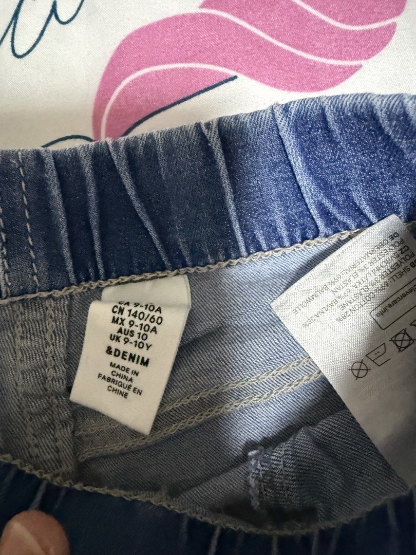 H&M Denim Blue Cuffed Denim Shorts (Category: Babies & Kids Fashion) located in Calamba. Submitted by sofiesmerch (Listing ID 1466336569, Image 2). Description: - Brand: Denim brand - Color: Blue - Size: UK 9-10Y, CN 140/60 - Material: 69% cotton, 28% polyester, 3% elastane - Style: Pull-on with elastic waistband and rolled-up cuffs - Condition: Great casual piece for everyday.