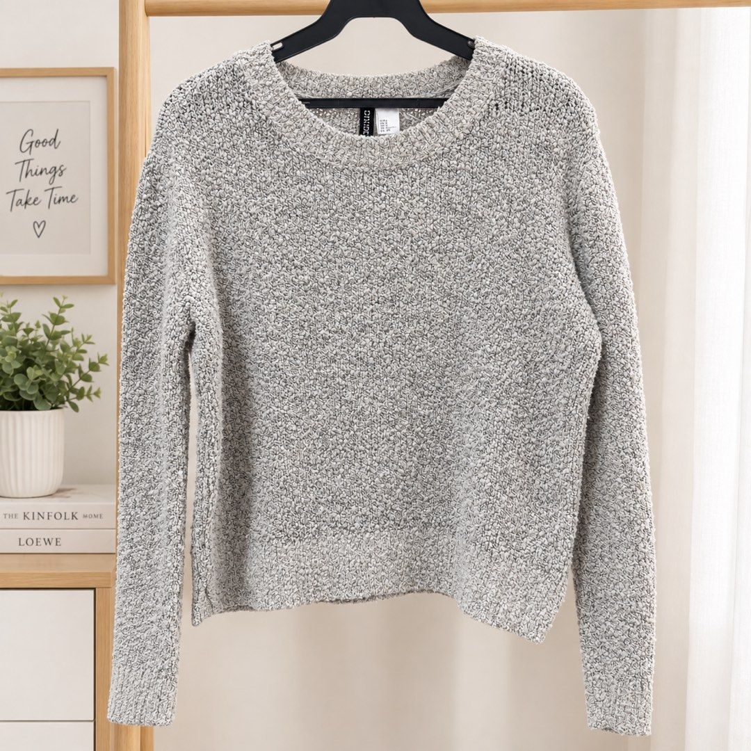 H&M Divided Grey Textured Knit Sweater Size S (Category: Longsleeves) located in Marikina City. Submitted by preloved_n_reloved (Listing ID 1466238341, Image 1). Description: - Brand: H&M Divided - Size: Small - Color/Pattern: Grey speckled, textured knit - Material: Soft and fuzzy - Design: Crew neck, long sleeves with ribbed cuffs - Condition/Vibe: Great basic layer for cooler weather, easy to match with jeans or skirts.