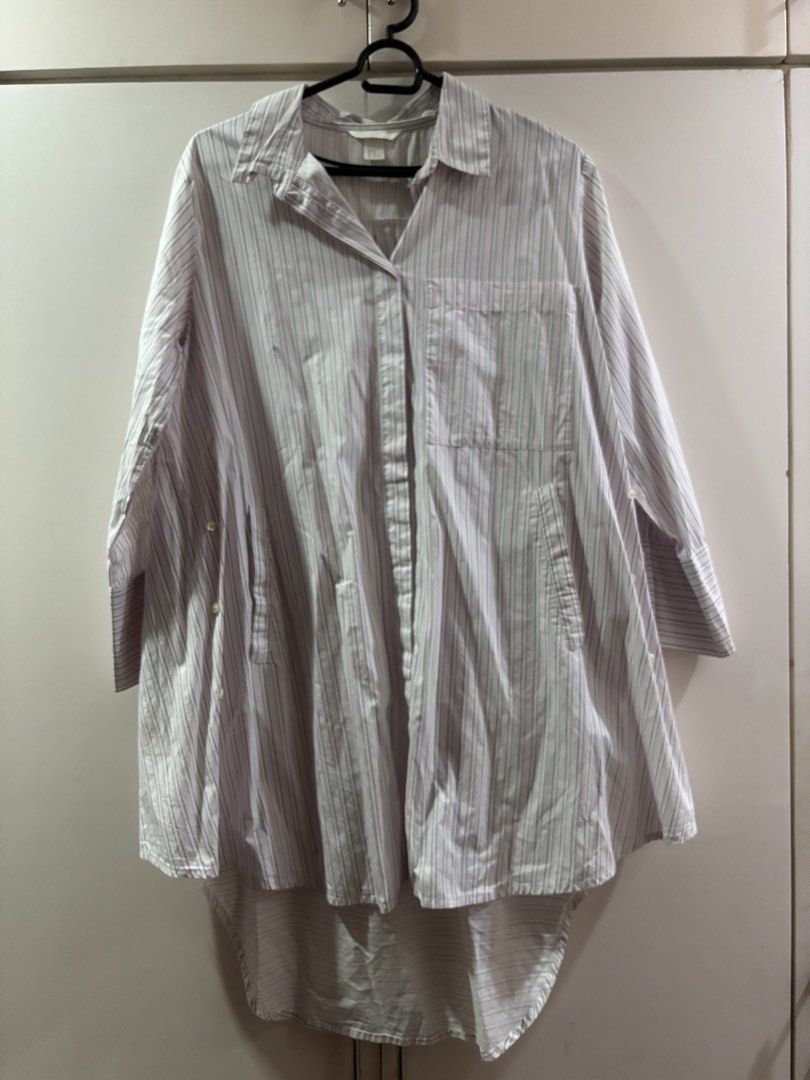 H&M Striped Oversized Button Down Shirt (Category: Shirts) located in Las Pinas. Submitted by misg0905 (Listing ID 1466236767, Image 1). Description: - Brand: H&M - Style: Striped button-down shirt with a relaxed, oversized fit - Details: Classic collar, long sleeves, single chest pocket - Fit: Longer curved hem in the back for added coverage - Material: Lightweight and breathable - Condition: Excellent pre-loved condition, ready to wear!.