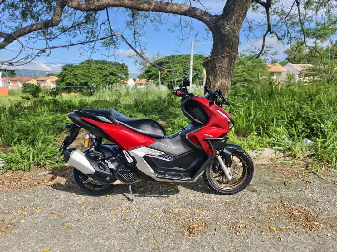 Honda ADV 160 RED (Category: Motorbikes for Sale) located in Antipolo. Submitted by swanity27 (Listing ID 1466193044, Image 3). Description: SALE/SWAP SA LOWER UNIT Honda ADV 160 ABS/HSTC 2023 MODEL MINIMAL UPGRADES: AFTERMARKET LEVER GUARD SEC CRASHGUARD NEW FRONT TIRE (CORSA) ALL STOCK ENGINE PRESTINE CONDITION WELL MAINTAINED 19K ODO (UNLI SCAN) COMPLETE ORIGINAL PAPERS (ORCR) ORIGINAL LTO PLATE FIRST OWNER AQUIRED OPEN DOS READY FOR LONG DRIV