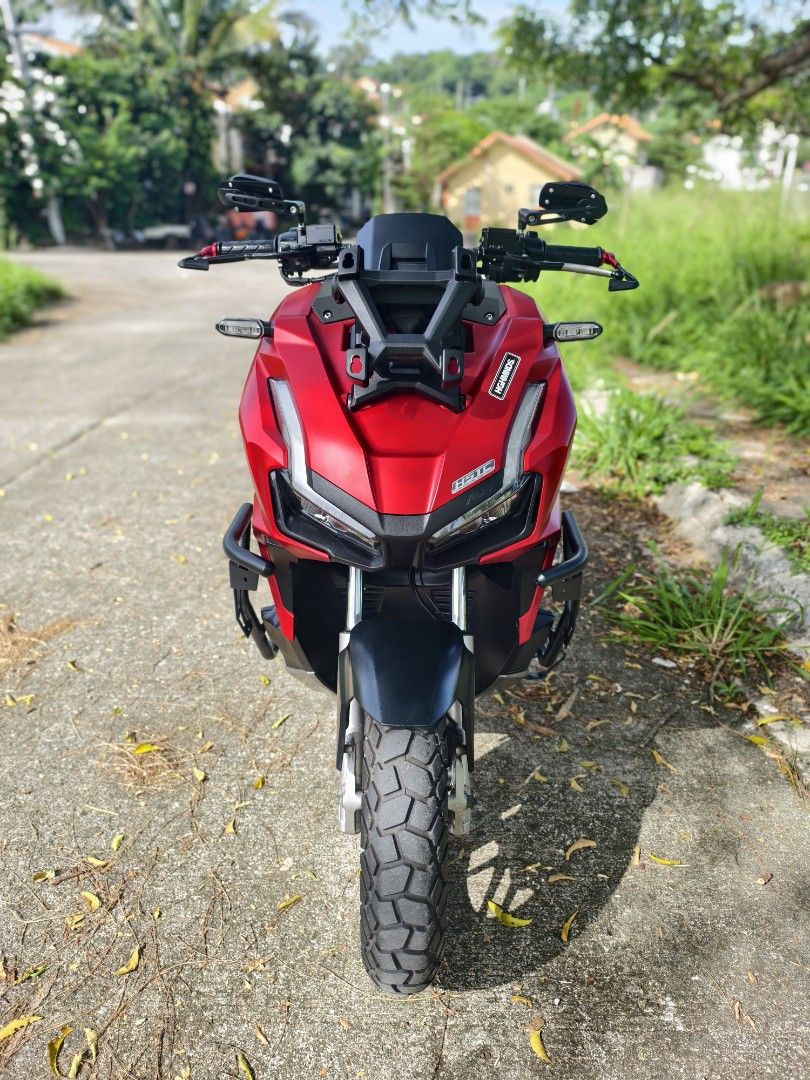 Honda ADV 160 RED (Category: Motorbikes for Sale) located in Antipolo. Submitted by swanity27 (Listing ID 1466193044, Image 2). Description: SALE/SWAP SA LOWER UNIT Honda ADV 160 ABS/HSTC 2023 MODEL MINIMAL UPGRADES: AFTERMARKET LEVER GUARD SEC CRASHGUARD NEW FRONT TIRE (CORSA) ALL STOCK ENGINE PRESTINE CONDITION WELL MAINTAINED 19K ODO (UNLI SCAN) COMPLETE ORIGINAL PAPERS (ORCR) ORIGINAL LTO PLATE FIRST OWNER AQUIRED OPEN DOS READY FOR LONG DRIV