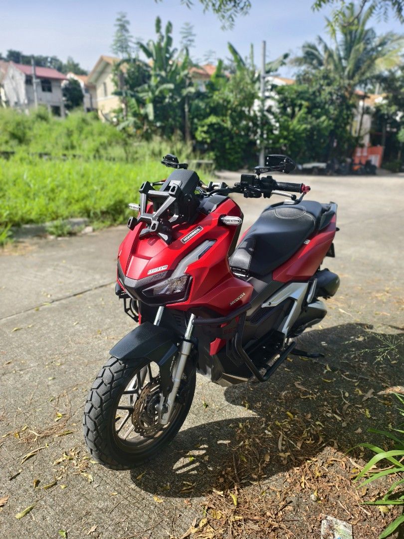Honda ADV 160 RED (Category: Motorbikes for Sale) located in Antipolo. Submitted by swanity27 (Listing ID 1466193044, Image 1). Description: SALE/SWAP SA LOWER UNIT Honda ADV 160 ABS/HSTC 2023 MODEL MINIMAL UPGRADES: AFTERMARKET LEVER GUARD SEC CRASHGUARD NEW FRONT TIRE (CORSA) ALL STOCK ENGINE PRESTINE CONDITION WELL MAINTAINED 19K ODO (UNLI SCAN) COMPLETE ORIGINAL PAPERS (ORCR) ORIGINAL LTO PLATE FIRST OWNER AQUIRED OPEN DOS READY FOR LONG DRIV