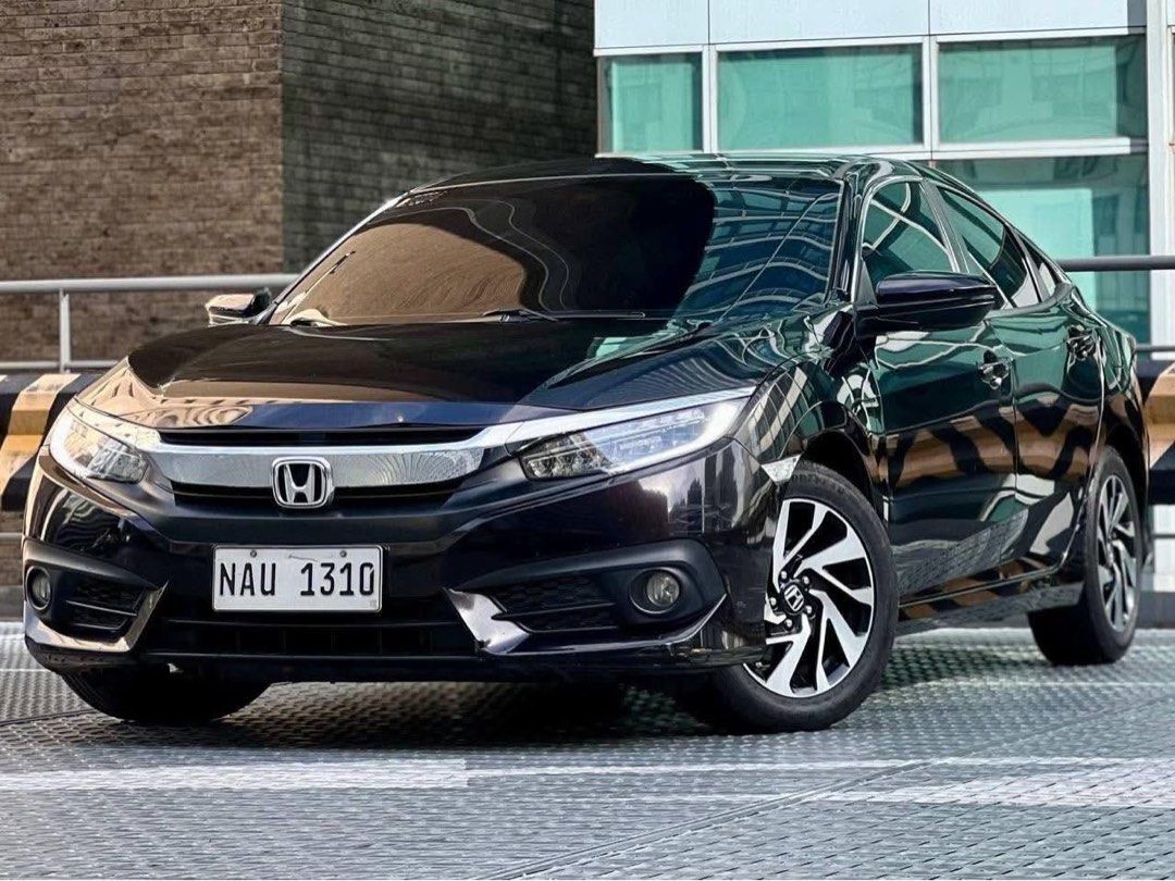 Honda Civic 1.8 (A) (Category: Used Cars) located in Makati City. Submitted by maby_latido05 (Listing ID 1466252349, Image 3). Description: 2017 Honda Civic 1.8 E Gas AT 90k ALL IN DP PROMO‼️🔥 2 YRS - Php 35,302 3 YRS - Php 25,507 4 YRS - Php 21,151 (Chattel & Insurance included) FREE FULL VEHICLE SCANNING FREE Transfer FREE Detailing FREE Bank Processing 100% LEGIT MILEAGE 1ST OWNERSHIP Well-maintained Mileage 56k (Service booklet) Ending NAU 1